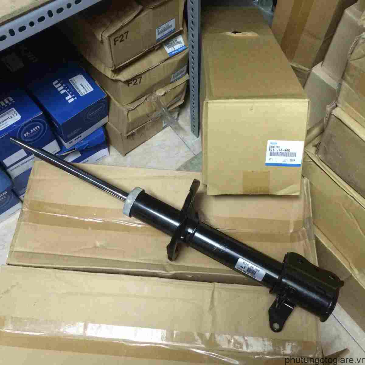 Giảm xóc sau phải Mazda 323FL