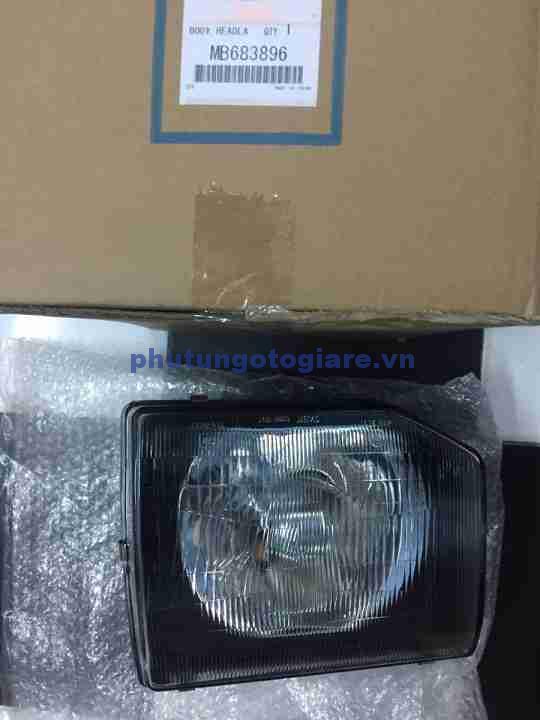 Đèn pha Mitsubishi Pajero V31