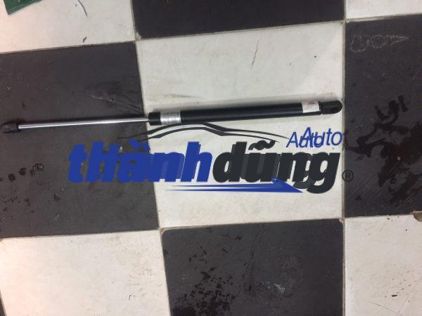 TY ĐẨY NẮP CAPO NISSAN NAVARA