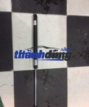 TY ĐẨY NẮP CAPO NISSAN NAVARA