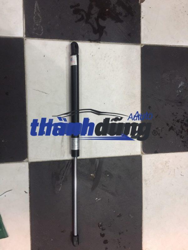 TY ĐẨY NẮP CAPO NISSAN NAVARA