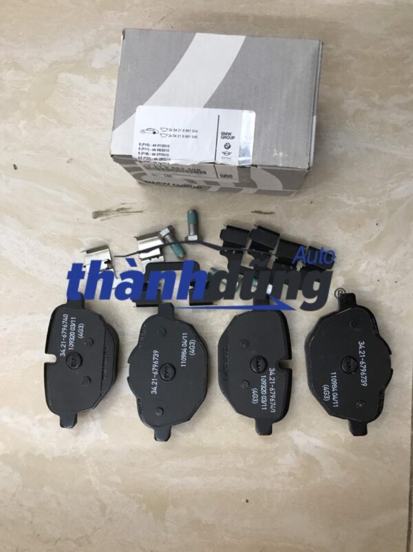 Má phanh sau BMW 320i